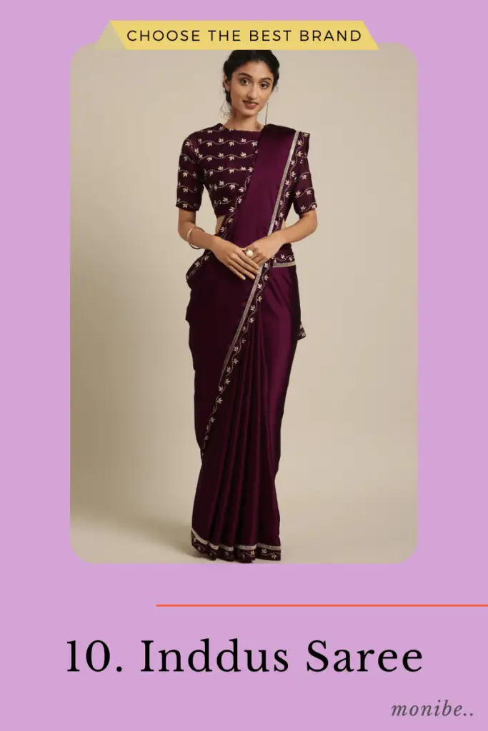 women wearing a dark purple color inddus brand saree